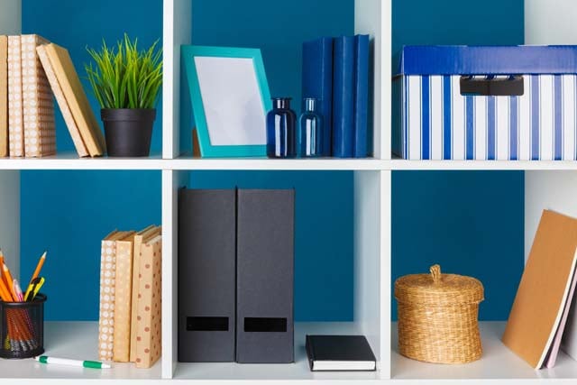 white-office-shelves-with-different-stationery