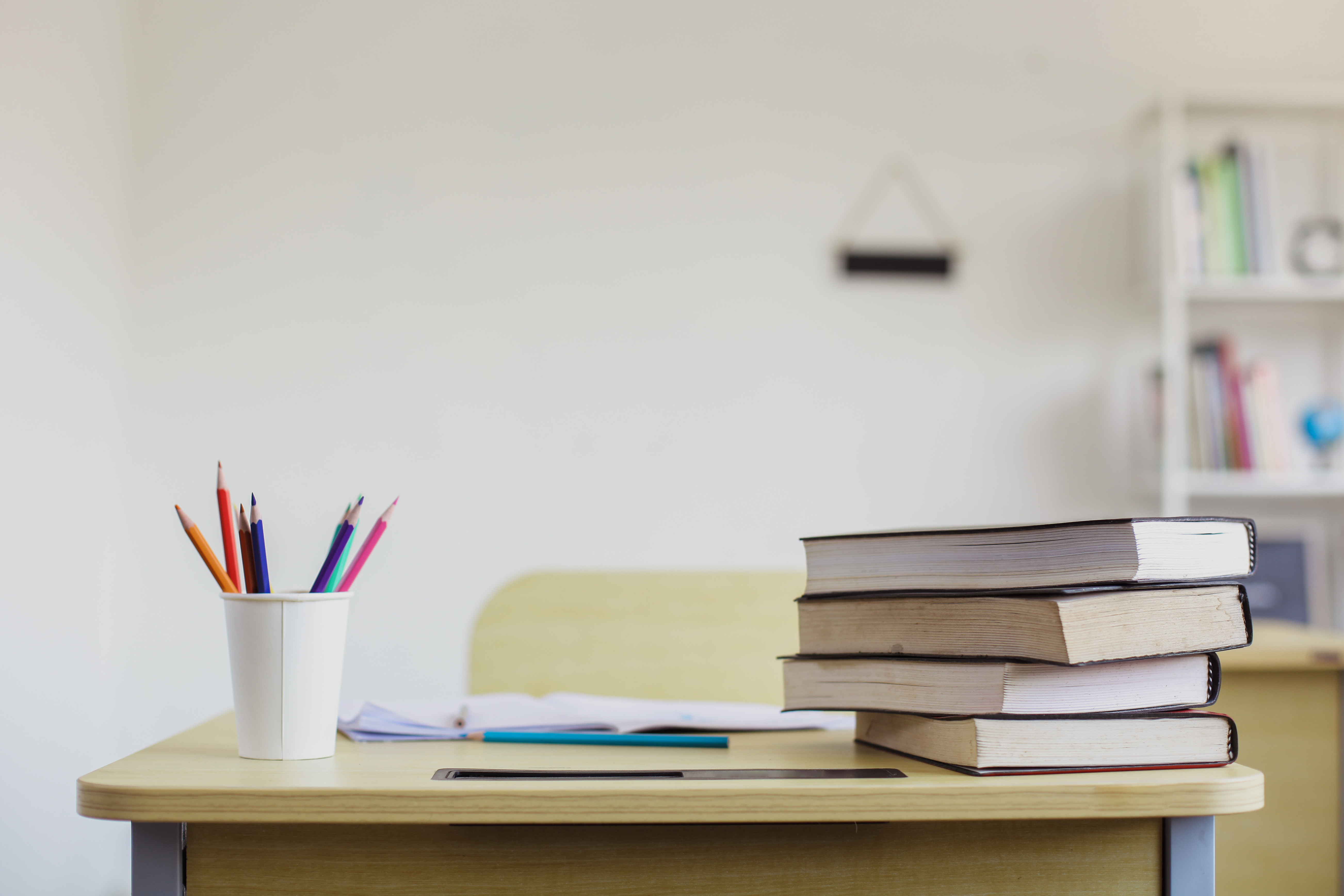 school-desk-with-books-and-stationary