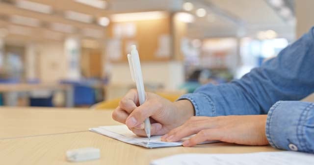 woman-do-her-homework-at-library