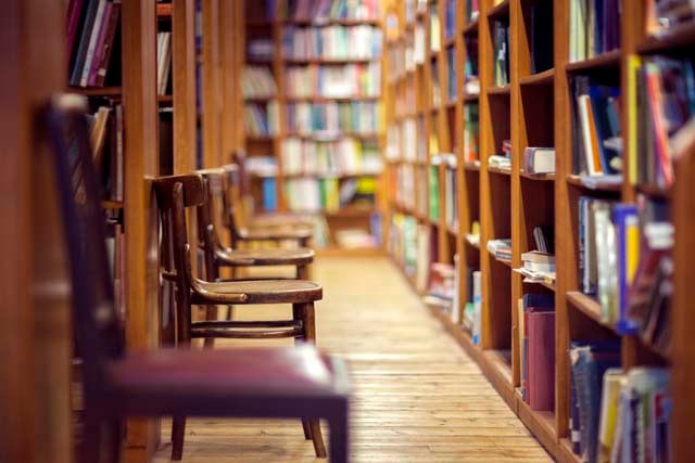 library-with-books-on-shelf-and-empty